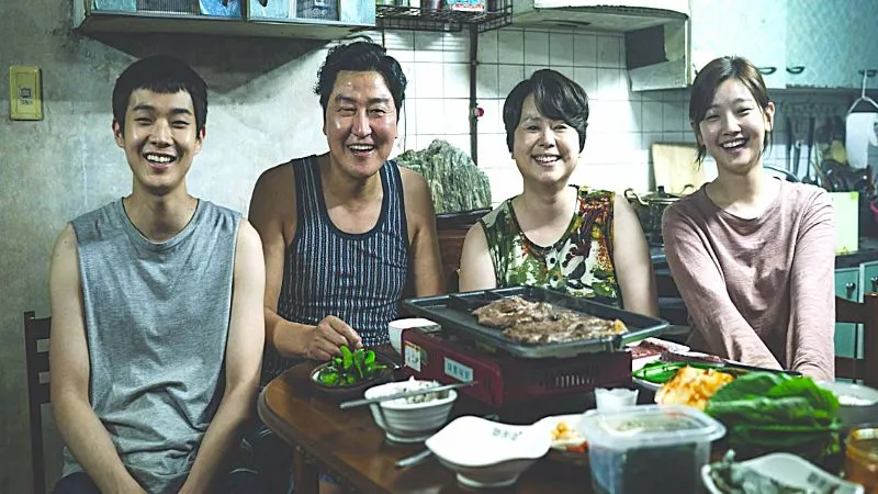 Song Kang-ho, Jang Hye-jin, Choi Woo-sik, and Park So-dam in Parasite (2019) as Ki-woo, Ki-taek, Chung-sook and Ki-jung